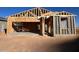 House under construction; wood framing visible at 47748 W Kenner Dr, Maricopa, AZ 85139