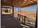 Interior framing of a house under construction; view to exterior at 47748 W Kenner Dr, Maricopa, AZ 85139