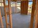 New home interior framing with concrete flooring at 47748 W Kenner Dr, Maricopa, AZ 85139