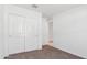 Well-lit bedroom with double door closet and carpet flooring at 5484 E Rock Bush Ln, San Tan Valley, AZ 85140