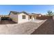 New construction home with a large backyard and paved patio at 6208 S Eagle Pass Rd, Gold Canyon, AZ 85118