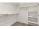 Spacious walk-in closet with ample shelving and hanging rods at 6208 S Eagle Pass Rd, Gold Canyon, AZ 85118