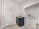 Laundry room with utility sink and shelving at 6208 S Eagle Pass Rd, Gold Canyon, AZ 85118