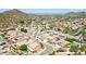 Neighborhood view with houses, pools and desert landscape at 6618 W Red Fox Rd, Phoenix, AZ 85083