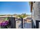 Elevated view of backyard with firepit and mountain views at 6618 W Red Fox Rd, Phoenix, AZ 85083