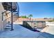 Backyard with a pool and spiral staircase at 6618 W Red Fox Rd, Phoenix, AZ 85083