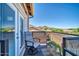 Private balcony with seating and mountain views at 6618 W Red Fox Rd, Phoenix, AZ 85083