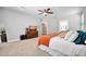 Spacious bedroom with carpet flooring and ceiling fan at 6618 W Red Fox Rd, Phoenix, AZ 85083