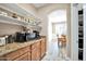 Kitchen pantry with coffee bar and additional shelving at 6618 W Red Fox Rd, Phoenix, AZ 85083