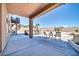 Covered patio with rocking chairs and a view at 6618 W Red Fox Rd, Phoenix, AZ 85083