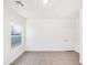 Empty bedroom with tile floors and a window at 6638 S 6Th Ave, Phoenix, AZ 85041