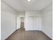 Bright bedroom with tile floors and double door closet at 6638 S 6Th Ave, Phoenix, AZ 85041