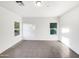 Simple bedroom with neutral colors and tile floors at 6638 S 6Th Ave, Phoenix, AZ 85041