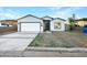 Newly constructed single-story home with a two-car garage and front yard at 6638 S 6Th Ave, Phoenix, AZ 85041