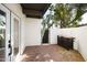 Private patio with wrought iron gate and built-in grill at 6840 E 2Nd St # 14, Scottsdale, AZ 85251