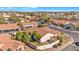 Aerial view showing a house, yard, and surrounding neighborhood at 710 S Monterey St, Gilbert, AZ 85233