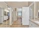 Bathroom with mirrored closet doors and hardwood floors at 710 S Monterey St, Gilbert, AZ 85233