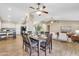 Bright dining room adjacent to the kitchen with wood flooring at 710 S Monterey St, Gilbert, AZ 85233