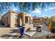 Backyard with built-in grill and fire pit at 7105 E Hibiscus Way, Scottsdale, AZ 85266