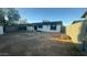 Large backyard with unfinished landscaping and storage materials at 7213 W Osborn Rd, Phoenix, AZ 85033