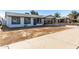 Newly renovated single story home with carport and front yard at 7213 W Osborn Rd, Phoenix, AZ 85033