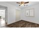 Spacious bedroom with double closet and wood-look floors at 740 W Tuckey Ln, Phoenix, AZ 85013