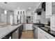 Modern kitchen featuring stainless steel appliances and a large island at 740 W Tuckey Ln, Phoenix, AZ 85013