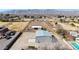 Aerial view of property showing multiple buildings, including a large garage at 7528 N 185Th Ave, Waddell, AZ 85355