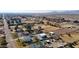 Wide aerial view of a house and surrounding desert landscape at 7528 N 185Th Ave, Waddell, AZ 85355