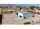 Aerial view showcasing a large workshop and surrounding land at 7528 N 185Th Ave, Waddell, AZ 85355