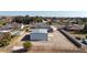 Aerial view of a metal barn near a residential area at 7528 N 185Th Ave, Waddell, AZ 85355