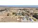 Aerial view of property showing house, pool, and expansive land at 7528 N 185Th Ave, Waddell, AZ 85355