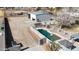 Aerial view of property showing a pool, garage, and workshop at 7528 N 185Th Ave, Waddell, AZ 85355