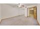 Bedroom with carpet flooring and mirrored closet doors at 7528 N 185Th Ave, Waddell, AZ 85355