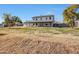 Two-story house with covered porch and a large front yard at 7528 N 185Th Ave, Waddell, AZ 85355