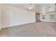 Living area with fireplace and carpet flooring at 7528 N 185Th Ave, Waddell, AZ 85355