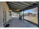 Large covered patio, overlooking the backyard at 7528 N 185Th Ave, Waddell, AZ 85355