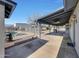 Covered patio with built-in grill and pool view at 7528 N 185Th Ave, Waddell, AZ 85355