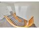 Elegant curved staircase with wood railings at 7528 N 185Th Ave, Waddell, AZ 85355