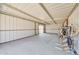 Empty storage area with concrete floor and tack hanging at 7528 N 185Th Ave, Waddell, AZ 85355