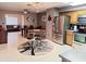 Modern kitchen with stainless steel appliances and wood cabinets at 8020 E Keats Ave # 269, Mesa, AZ 85209