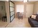 Home office with desk, chair, and glass-paned room divider at 8020 E Keats Ave # 269, Mesa, AZ 85209