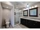 Modern bathroom with double sinks and a walk-in shower at 8225 N Central Ave # 46, Phoenix, AZ 85020