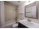 Clean bathroom with tub, shower, and updated vanity at 8225 N Central Ave # 46, Phoenix, AZ 85020