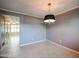 Bright dining area with tile floors and chandelier at 8225 N Central Ave # 46, Phoenix, AZ 85020