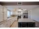 Updated kitchen with white cabinets and tile floors at 8225 N Central Ave # 46, Phoenix, AZ 85020