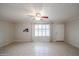 Living room with tile floors and plantation shutters at 8225 N Central Ave # 46, Phoenix, AZ 85020