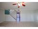 Living room with view of kitchen and staircase at 8225 N Central Ave # 46, Phoenix, AZ 85020