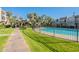 Inviting community pool with grassy areas and walkways at 8225 N Central Ave # 46, Phoenix, AZ 85020