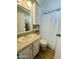 Bathroom with shower/tub combo, vanity, and linen storage at 8700 E University Dr # 1049, Mesa, AZ 85207